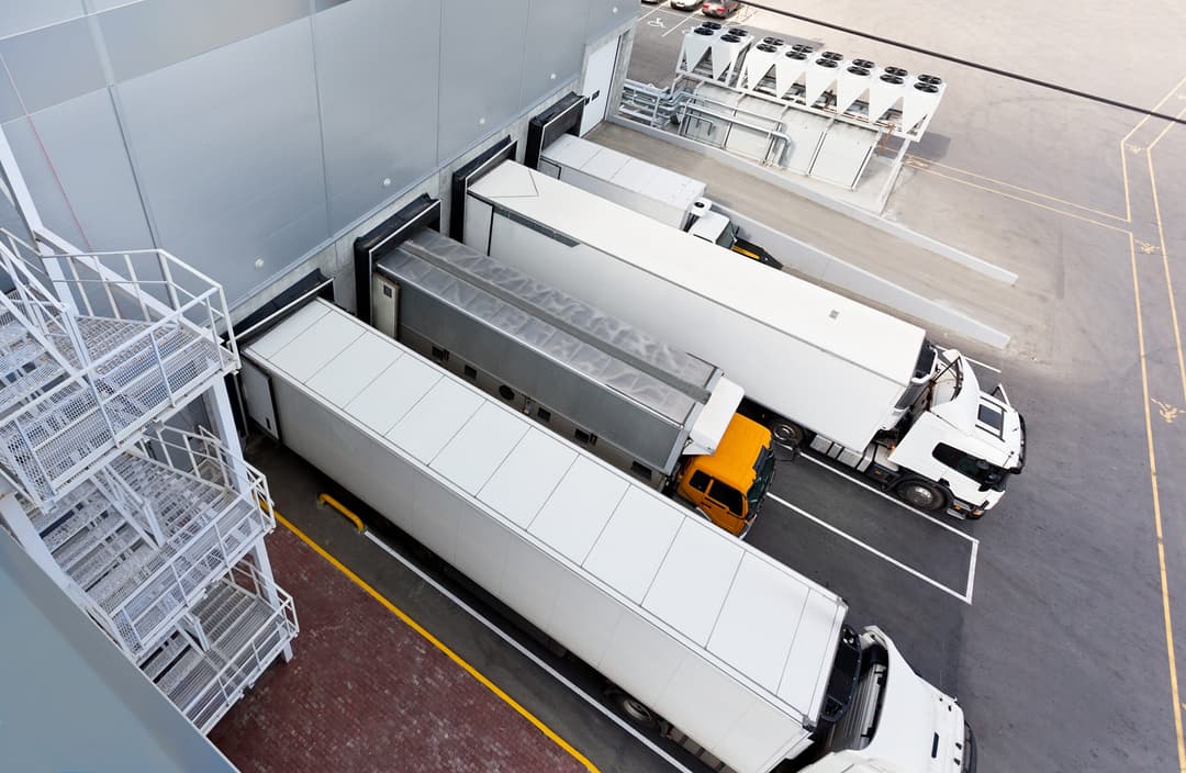 Big,Distribution,Warehouse,With,Gates,For,Loads,And,Trucks